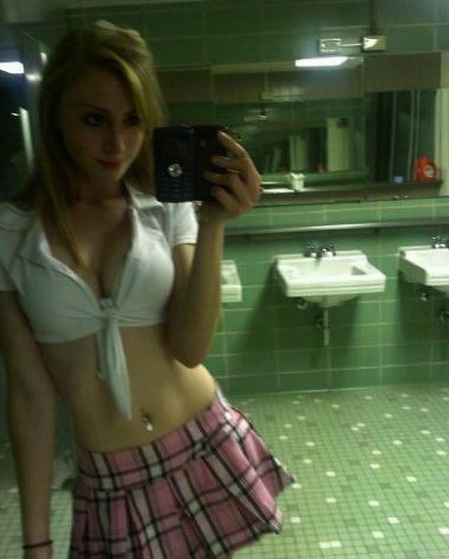 Teen in a school bathroom xxx