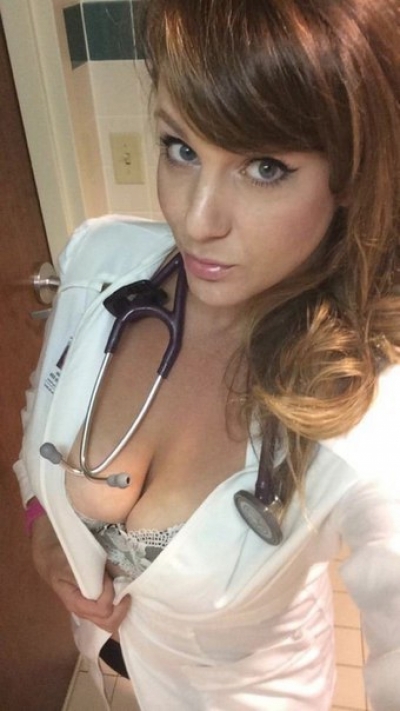 sexy doctor posing for selfie