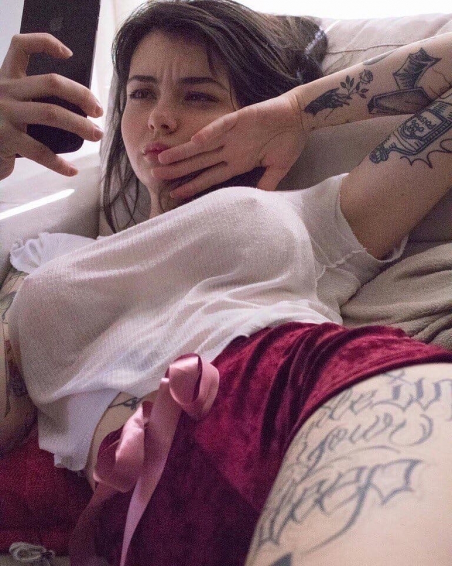 Cute girl in bed selfie