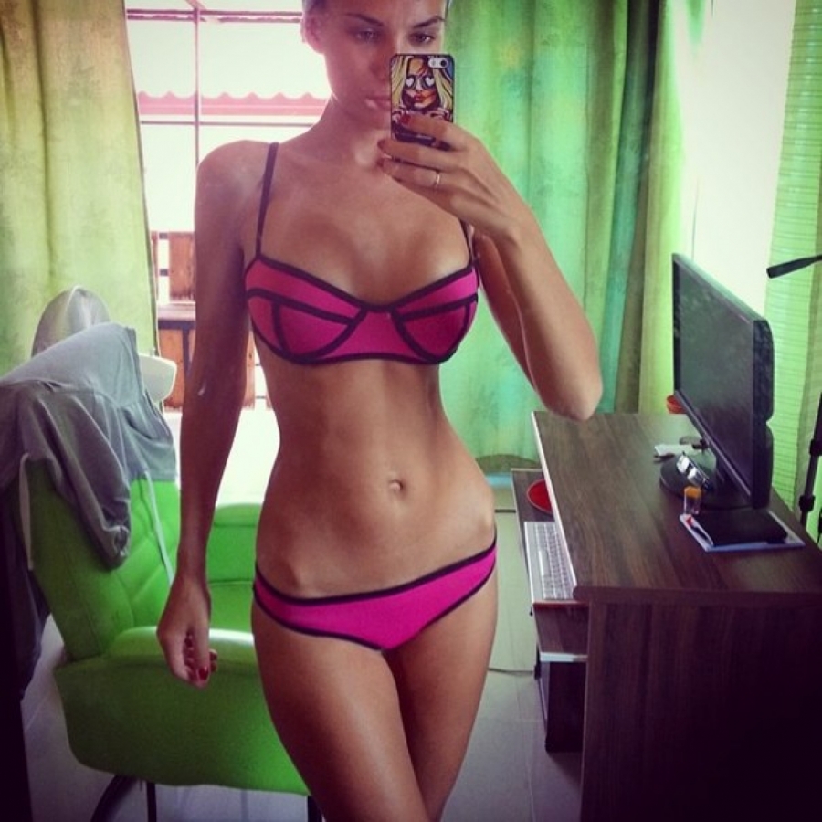 beautifull girl in pink bikini selfie